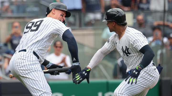 Aug 4, 2024; Bronx, New York, USA; New York Yankees right fielder Juan Soto (22) celebrates his solo home run during the seventh inning against the Toronto Blue Jays with left fielder Aaron Judge (99) at Yankee Stadium. Mandatory Credit: Vincent Carchietta-USA TODAY Sports Aug 4, 2024; Bronx, New York, USA; New York Yankees right fielder Juan Soto (22) celebrates his solo home run during the seventh inning against the Toronto Blue Jays with left fielder Aaron Judge (99) at Yankee Stadium. Mandatory Credit: Vincent Carchietta-USA TODAY Sports