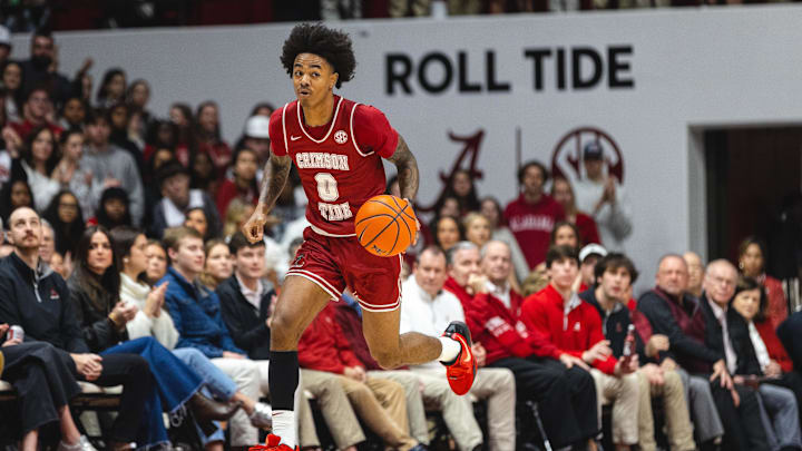 Jan 25, 2025; Tuscaloosa, Alabama, USA; Alabama Crimson Tide guard Labaron Philon (0) drives the ball against the LSU Tigers during the second half at Coleman Coliseum. Mandatory Credit: Will McLelland-Imagn Images