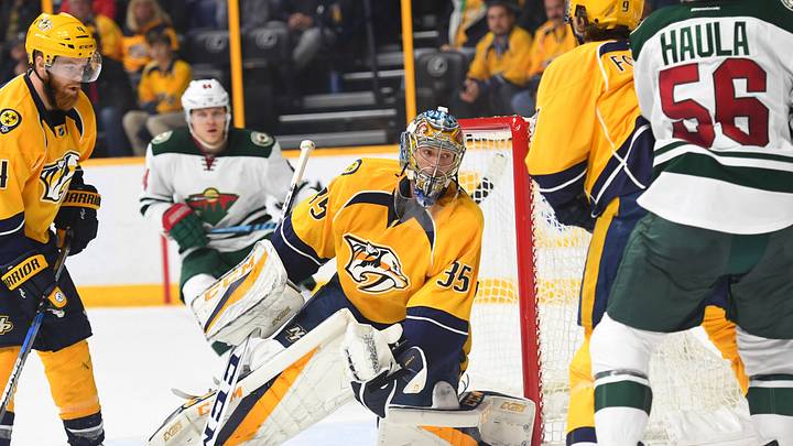 Dec 27, 2016; Nashville, TN, USA; Nashville Predators goalie Pekka Rinne (35) holds on to the puck after a save in overtime against the Minnesota Wild at Bridgestone Arena. Minnesota won 3-2 in overtime. Mandatory Credit: Christopher Hanewinckel-USA TODAY Sports
