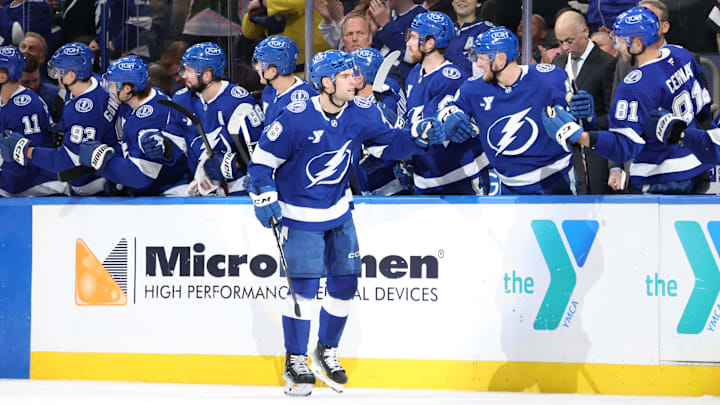 Feb 6, 2025; Tampa, Florida, USA; Tampa Bay Lightning left wing Brandon Hagel (38) is congratulated after scoring against the Ottawa Senators during the second period at Amalie Arena. Mandatory Credit: Kim Klement Neitzel-Imagn Images