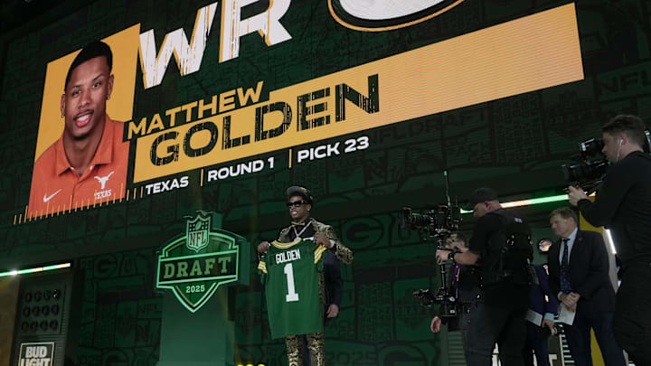 Receiver Matthew Golden of Texas poses after being selected in the first round by the Green Bay Packers.