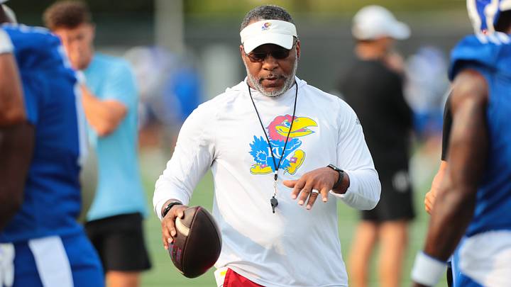 Kansas wide receivers coach Terrence Samuel helps players through drills during fall camp practice on Aug. 4, 2026. Kansas wide receivers coach Terrence Samuel helps players through drills during fall camp practice on Aug. 4, 2026.