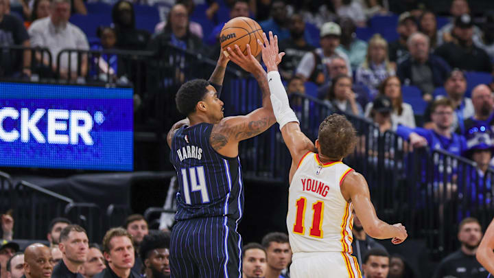 Apr 8, 2025; Orlando, Florida, USA; Orlando Magic guard Gary Harris (14) shoots a three point basket against Atlanta Hawks guard Trae Young (11) during the second quarter at Kia Center. Mandatory Credit: Mike Watters-Imagn Images Apr 8, 2025; Orlando, Florida, USA; Orlando Magic guard Gary Harris (14) shoots a three point basket against Atlanta Hawks guard Trae Young (11) during the second quarter at Kia Center. Mandatory Credit: Mike Watters-Imagn Images