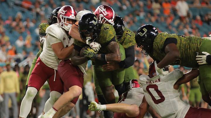 Oct 25, 2025; Miami Gardens, Florida, USA; Miami Hurricanes running back Mark Fletcher Jr. (4) carries the football for a touchdown against the Stanford Cardinal during the third quarter at Hard Rock Stadium. Mandatory Credit: Sam Navarro-Imagn Images