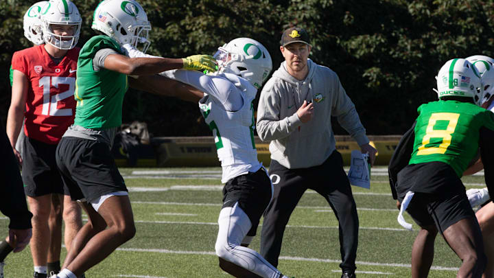 Oregon Offensive Coordinator Will Stein, right, supervises a drill during the second spring practice for the Oregon Duck football team on Saturday, March 16, 2024.