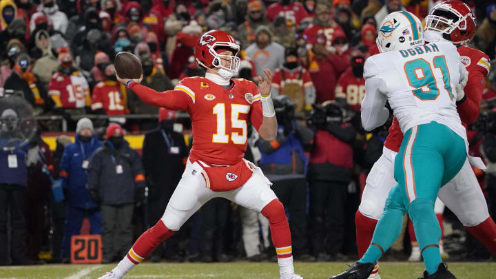 Jan 13, 2024; Kansas City, Missouri, USA; Kansas City Chiefs quarterback Patrick Mahomes (15) throws under pressure from Miami Dolphins defensive end Emmanuel Ogbah (91) during the first half of the 2024 AFC wild card game at GEHA Field at Arrowhead Stadium. Mandatory Credit: Denny Medley-USA TODAY Sports Jan 13, 2024; Kansas City, Missouri, USA; Kansas City Chiefs quarterback Patrick Mahomes (15) throws under pressure from Miami Dolphins defensive end Emmanuel Ogbah (91) during the first half of the 2024 AFC wild card game at GEHA Field at Arrowhead Stadium. Mandatory Credit: Denny Medley-USA TODAY Sports