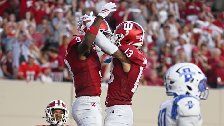 Sep 12, 2025; Indiana receivers Omar Cooper Jr. and Elijah Sarratt celebrate after a touchdown against Indiana State. Sep 12, 2025; Indiana receivers Omar Cooper Jr. and Elijah Sarratt celebrate after a touchdown against Indiana State.