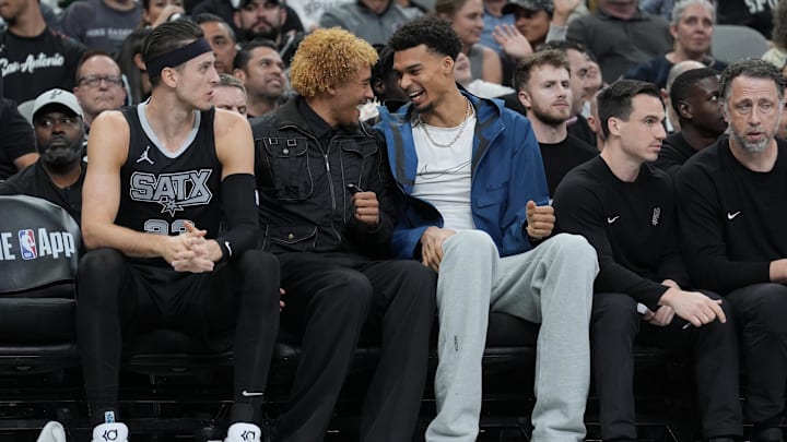 Nov 19, 2024; San Antonio, Texas, USA; San Antonio Spurs forward Jeremy Sochan (10) and center Victor Wembanyama (1) on the bench during the first half against the Oklahoma City Thunder at Frost Bank Center.