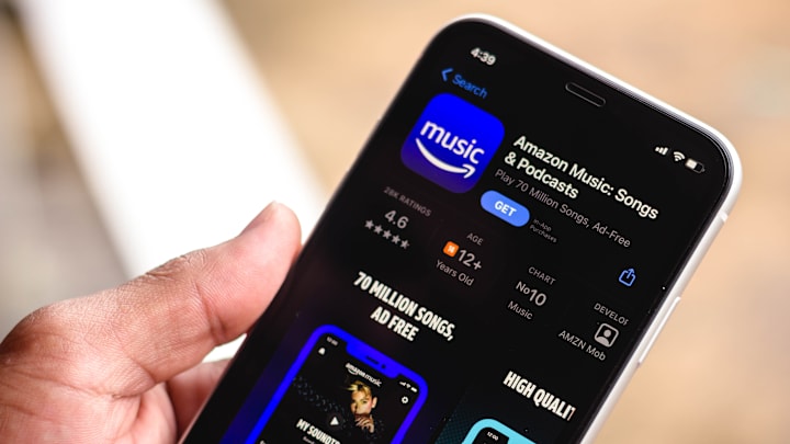 In this photo illustration the Amazon Music logo in App...