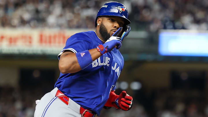 Toronto Blue Jays first baseman Vladimir Guerrero Jr. (27) reacts after hitting a two-run home run in the first inning against the New York Yankees during game three of the ALDS round for the 2025 MLB playoffs at Yankee Stadium. Toronto Blue Jays first baseman Vladimir Guerrero Jr. (27) reacts after hitting a two-run home run in the first inning against the New York Yankees during game three of the ALDS round for the 2025 MLB playoffs at Yankee Stadium.
