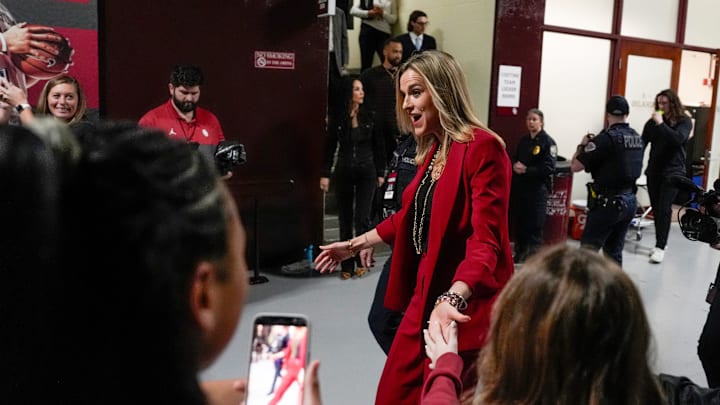 Oklahoma coach Jennie Baranczyk walking down the tunnel before a game at the Lloyd Noble Center.