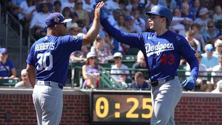 Mar 15, 2026; Mesa, Arizona, USA; Los Angeles Dodgers right fielder Jack Suwinski celebrates with manager Dave Roberts (30) after hitting a three run home run against the Chicago Cubs in the first inning at Sloan Park. Mandatory Credit: Rick Scuteri-Imagn Images Mar 15, 2026; Mesa, Arizona, USA; Los Angeles Dodgers right fielder Jack Suwinski celebrates with manager Dave Roberts (30) after hitting a three run home run against the Chicago Cubs in the first inning at Sloan Park. Mandatory Credit: Rick Scuteri-Imagn Images