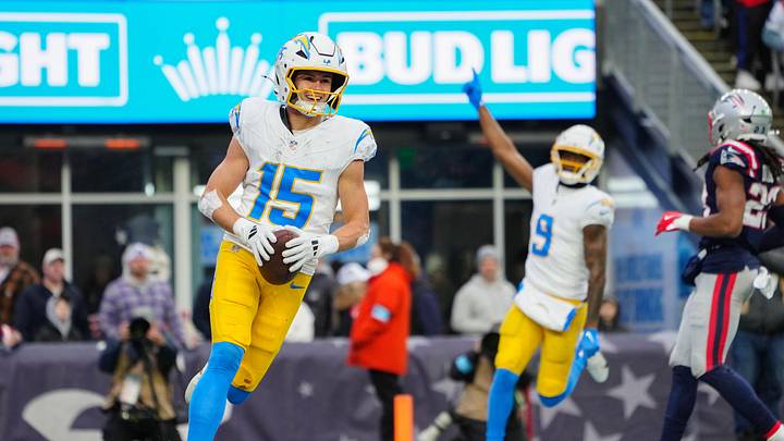 Dec 28, 2024; Foxborough, Massachusetts, USA; Los Angeles Chargers wide receiver Ladd McConkey (15) reacts to scoring a touchdown against the New England Patriots during the second half at Gillette Stadium. Mandatory Credit: Gregory Fisher-Imagn Images