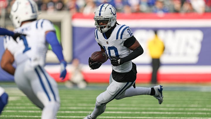 Dec 29, 2024; East Rutherford, New Jersey, USA; Indianapolis Colts wide receiver Adonai Mitchell (10) gains yards after catch during the first half against the New York Giants at MetLife Stadium. Mandatory Credit: Vincent Carchietta-Imagn Images