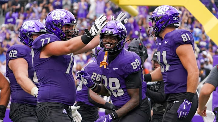 Oct 18, 2025; Fort Worth, Texas, USA; TCU Horned Frogs tight end Ka'Morreun Pimpton (88) reacts with offensive lineman Cooper Powers (77) and tight end Chase Curtis (81) after scoring a touchdown against the Baylor Bears during the second half of a game at Amon G. Carter Stadium. Oct 18, 2025; Fort Worth, Texas, USA; TCU Horned Frogs tight end Ka'Morreun Pimpton (88) reacts with offensive lineman Cooper Powers (77) and tight end Chase Curtis (81) after scoring a touchdown against the Baylor Bears during the second half of a game at Amon G. Carter Stadium.