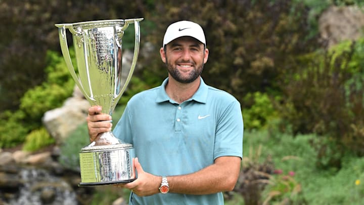 Aug 17, 2025; Owings Mills, Maryland, USA; Scottie Scheffler poses with the J. K. Wadley Trophy after winning the BMW Championship golf tournament. Mandatory Credit: Rafael Suanes-Imagn Images Aug 17, 2025; Owings Mills, Maryland, USA; Scottie Scheffler poses with the J. K. Wadley Trophy after winning the BMW Championship golf tournament. Mandatory Credit: Rafael Suanes-Imagn Images