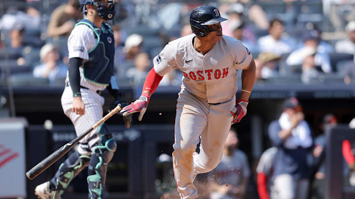 Sep 14, 2024; Bronx, New York, USA; Boston Red Sox third baseman Rafael Devers (11) follows through on a two run single against the New York Yankees during the fifth inning at Yankee Stadium. Mandatory Credit: Brad Penner-Imagn Images Sep 14, 2024; Bronx, New York, USA; Boston Red Sox third baseman Rafael Devers (11) follows through on a two run single against the New York Yankees during the fifth inning at Yankee Stadium. Mandatory Credit: Brad Penner-Imagn Images