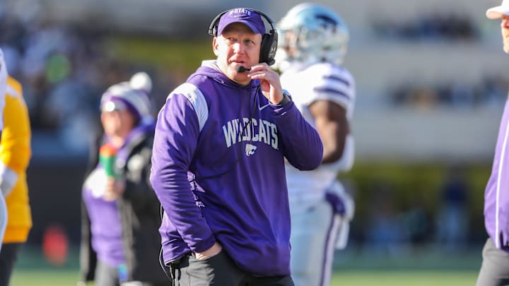 Nov 19, 2022; Morgantown, West Virginia, USA; Kansas State Wildcats head coach Chris Klieman watches the field during a timeout against Baylor.