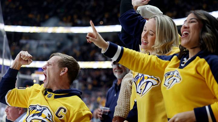 Oct 17, 2026; Nashville, Tennessee, USA; Nashville Predators fans celebrate a goal against the St. Louis Blues during the first period at Bridgestone Arena. Mandatory Credit: Alan Poizner-Imagn Images Oct 17, 2026; Nashville, Tennessee, USA; Nashville Predators fans celebrate a goal against the St. Louis Blues during the first period at Bridgestone Arena. Mandatory Credit: Alan Poizner-Imagn Images