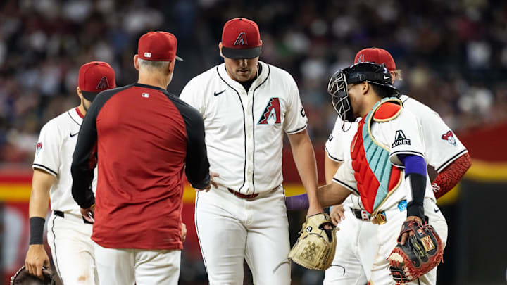 May 27, 2025; Phoenix, Arizona, USA; Arizona Diamondbacks pitcher Kevin Ginkel against the Pittsburgh Pirates at Chase Field. Mandatory Credit: Mark J. Rebilas-Imagn Images May 27, 2025; Phoenix, Arizona, USA; Arizona Diamondbacks pitcher Kevin Ginkel against the Pittsburgh Pirates at Chase Field. Mandatory Credit: Mark J. Rebilas-Imagn Images