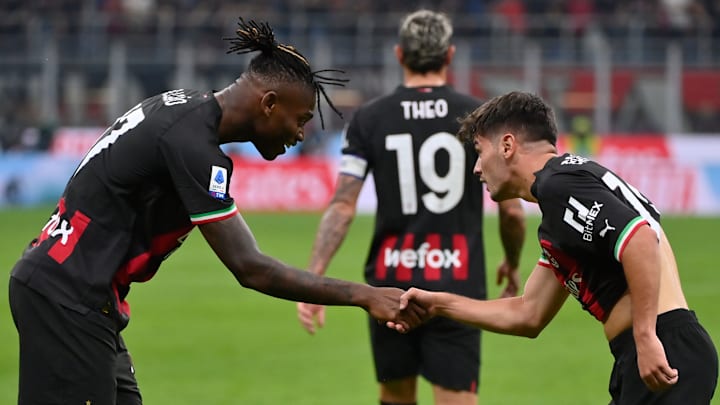 Brahim Diaz (right) celebrates Milan's second goal with Rafael Leao