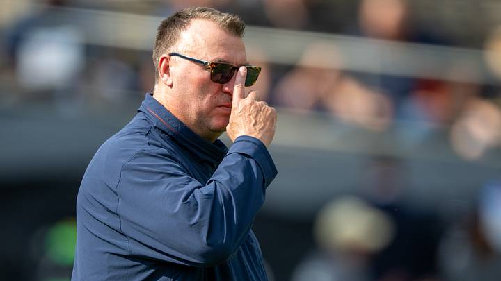 Oct 4, 2025; West Lafayette, Indiana, USA; Illinois Fighting Illini head coach Bret Bielema watches warm ups before the game against the Purdue Boilermakers at Ross-Ade Stadium. Mandatory Credit: Marc Lebryk-Imagn Images Oct 4, 2025; West Lafayette, Indiana, USA; Illinois Fighting Illini head coach Bret Bielema watches warm ups before the game against the Purdue Boilermakers at Ross-Ade Stadium. Mandatory Credit: Marc Lebryk-Imagn Images