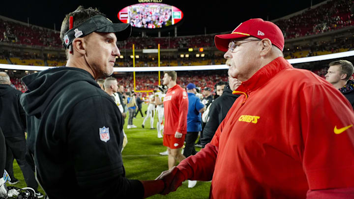 Dennis Allen shakes hands with Andy Reid following a Saints game against the Kansas City Chiefs.
