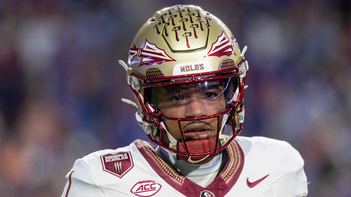 Nov 29, 2025; Gainesville, Florida, USA; Florida State Seminoles quarterback Tommy Castellanos (1) during the second quarter against the Florida Gators at Ben Hill Griffin Stadium. Mandatory Credit: Bob Kupbens-Imagn Images