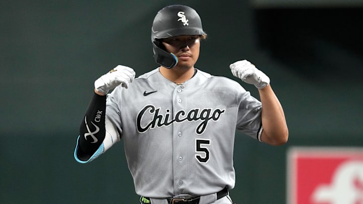 Apr 23, 2026; Phoenix, Arizona, USA; Chicago White Sox third baseman Munetaka Murakami (5) hits a single against the Arizona Diamondbacks in the third inning at Chase Field. Mandatory Credit: Rick Scuteri-Imagn Images