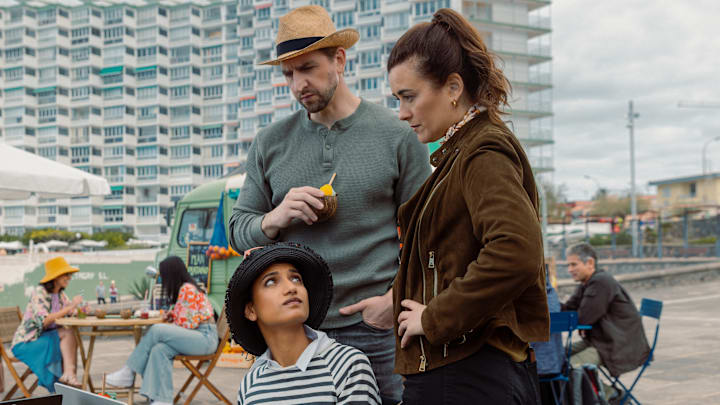 L-R Amita Suman as Claudette, Max Osinski as Boris and Cote De Pablo as Ziva David In NCIS: Tony & Ziva, episode 9, season 1, airing on Paramount+ 2025. Photo Credit: Marcell Piti/Paramount+