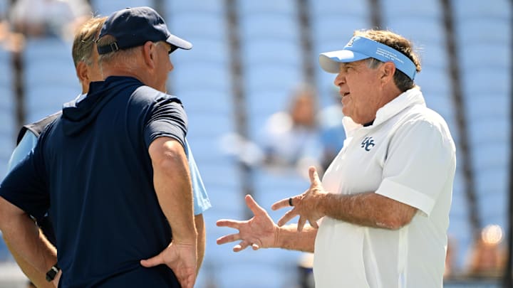 Sep 13, 2025; Chapel Hill, North Carolina, USA; North Carolina Tar Heels head coach Bill Belichick with Richmond Spiders head coach Russ Huesman before the game at Kenan Stadium. Mandatory Credit: Bob Donnan-Imagn Images
