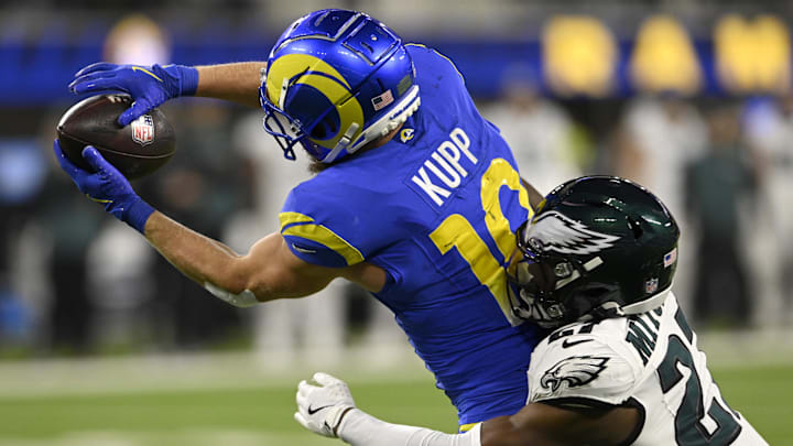 Nov 24, 2024; Inglewood, California, USA; Los Angeles Rams wide receiver Cooper Kupp (10) catches a touchdown pass against Philadelphia Eagles cornerback Quinyon Mitchell (27) during the second half at SoFi Stadium. Nov 24, 2024; Inglewood, California, USA; Los Angeles Rams wide receiver Cooper Kupp (10) catches a touchdown pass against Philadelphia Eagles cornerback Quinyon Mitchell (27) during the second half at SoFi Stadium.