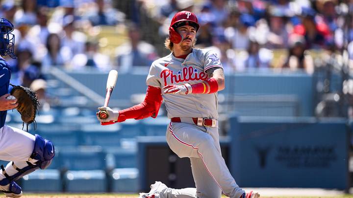 May 31, 2026; Los Angeles, California, USA; Philadelphia Phillies second baseman Bryson Stott (5) swings during the sixth inning against the Los Angeles Dodgers at Dodger Stadium. Mandatory Credit: William Liang-Imagn Images
