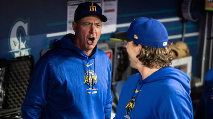 Seattle Mariners manager Dan Wilson (left) yells to starting pitcher Logan Gilbert before a game against the San Francisco Giants on Aug. 23 at T-Mobile Park. Seattle Mariners manager Dan Wilson (left) yells to starting pitcher Logan Gilbert before a game against the San Francisco Giants on Aug. 23 at T-Mobile Park.