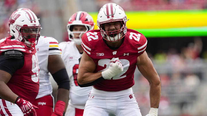 Sep 20, 2025; Madison, Wisconsin, USA;  Wisconsin Badgers linebacker Mason Reiger (22) reacts following a tackle during the third quarter against the Maryland Terrapins at Camp Randall Stadium.