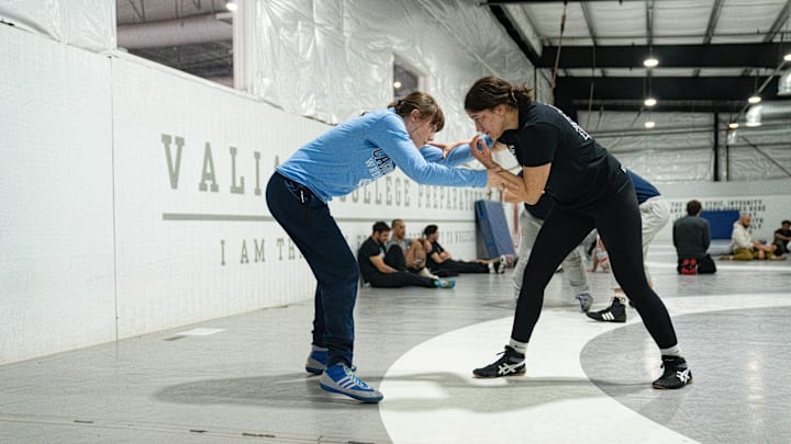 Everest Leydecker and Morgan Lucio practice after school at Valiant College Preparatory in Phoenix on Jan. 15, 2025.
