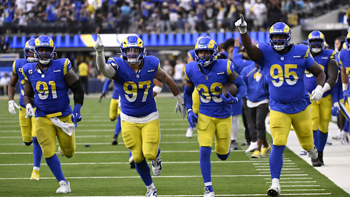 Oct 20, 2024; Inglewood, California, USA; Los Angeles Rams safety Jaylen McCollough (39) celebrates an interception with the rest of his team against the Las Vegas Raiders during the second half at SoFi Stadium. Mandatory Credit: Alex Gallardo-Imagn Images