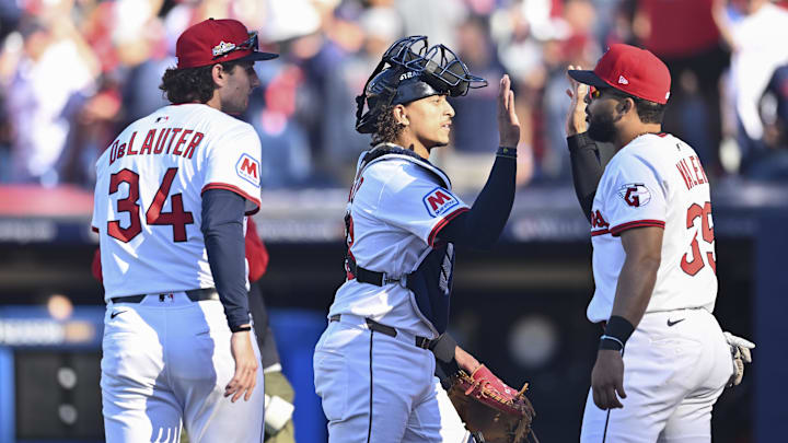 Oct 1, 2025; Cleveland, Ohio, USA; Cleveland Guardians center fielder Chase DeLauter (34), catcher Bo Naylor (23) and outfielder George Valera (35) celebrate after winning game two of the Wildcard round for the 2025 MLB playoffs against the Detroit Tigers at Progressive Field. Mandatory Credit: Ken Blaze-Imagn Images Oct 1, 2025; Cleveland, Ohio, USA; Cleveland Guardians center fielder Chase DeLauter (34), catcher Bo Naylor (23) and outfielder George Valera (35) celebrate after winning game two of the Wildcard round for the 2025 MLB playoffs against the Detroit Tigers at Progressive Field. Mandatory Credit: Ken Blaze-Imagn Images