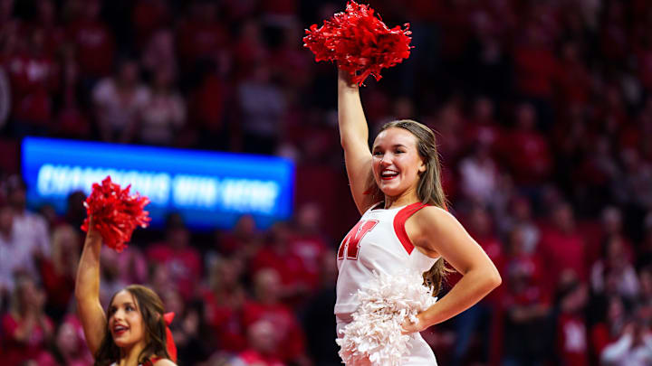 Nebraska Cornhuskers cheerleaders perform during a timeout in the fourth set against Texas A&M at Devaney Center. Nebraska Cornhuskers cheerleaders perform during a timeout in the fourth set against Texas A&M at Devaney Center.