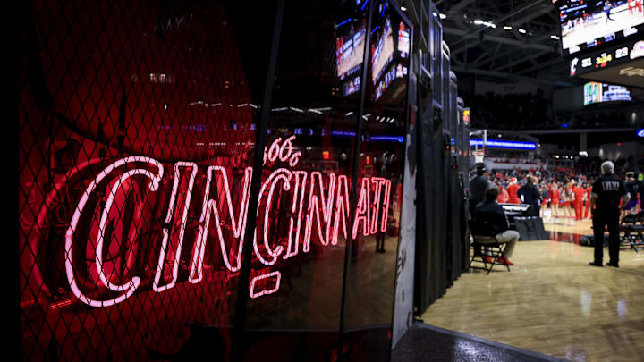 Dec 21, 2021; Cincinnati, Ohio, USA;  A view of the Cincinnati neon logo during a stop in play between the Tennessee Tech Golden Eagles and the Cincinnati Bearcats at Fifth Third Arena. Mandatory Credit: Aaron Doster-Imagn Images