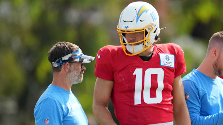 Aug 1, 2022; Costa Mesa, CA, USA; Los Angeles Chargers quarterback Justin Herbert (10) speaks with