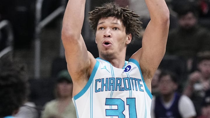 Jan 2, 2026; Milwaukee, Wisconsin, USA; Charlotte Hornets forward Tidjane Salaun (31) puts up a shot in the firs half against the Milwaukee Bucks at Fiserv Forum. Mandatory Credit: Michael McLoone-Imagn Images