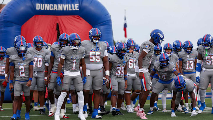 Duncanville enters the field before playing St. Frances Academy on Sept. 13 at Duncanville ISD Stadium.