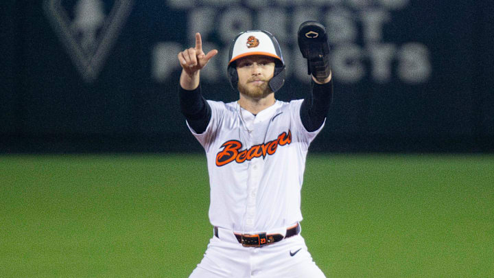 Oregon State's Canon Reeder (23) celebrates hitting a double during an NCAA college baseball game at Goss Stadium on Friday, March 7, 2025, in Corvallis, Ore. Oregon State's Canon Reeder (23) celebrates hitting a double during an NCAA college baseball game at Goss Stadium on Friday, March 7, 2025, in Corvallis, Ore.