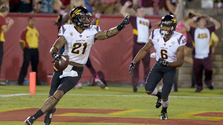 Oct 4, 2014; Los Angeles, CA, USA; Arizona State Sun Devils receiver Jaelen Strong (21) celebrates with receiver Cameron Smith (6) after catching a 53-yard touchdown pass on the final play of the game against the Southern California Trojans at Los Angeles Memorial Coliseum. Arizona State defeated USC 38-34. Mandatory Credit: Kirby Lee-Imagn Images Oct 4, 2014; Los Angeles, CA, USA; Arizona State Sun Devils receiver Jaelen Strong (21) celebrates with receiver Cameron Smith (6) after catching a 53-yard touchdown pass on the final play of the game against the Southern California Trojans at Los Angeles Memorial Coliseum. Arizona State defeated USC 38-34. Mandatory Credit: Kirby Lee-Imagn Images