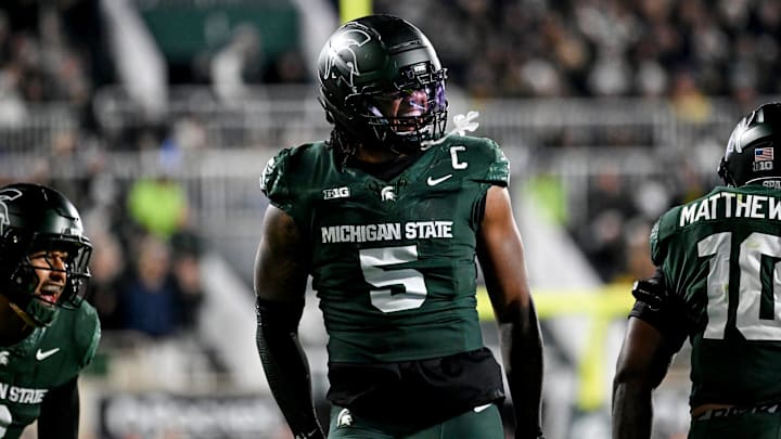 Michigan State's Jordan Hall celebrates after a stop against Michigan during the second quarter on Saturday, Oct. 25, 2025, at Spartan Stadium in East Lansing.