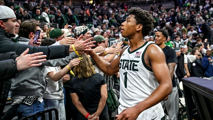 Michigan State's Jeremy Fears Jr. slaps hands with fans after the Spartans overtime win over Illinois on Saturday, Feb. 7, 2026, at the Breslin Center in East Lansing.