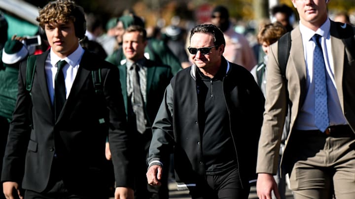 Michigan State's head coach Jonathan Smith, center, walks with the team to Spartan Stadium before the game against Indiana on Saturday, Nov. 2, 2024, in East Lansing. Michigan State's head coach Jonathan Smith, center, walks with the team to Spartan Stadium before the game against Indiana on Saturday, Nov. 2, 2024, in East Lansing.