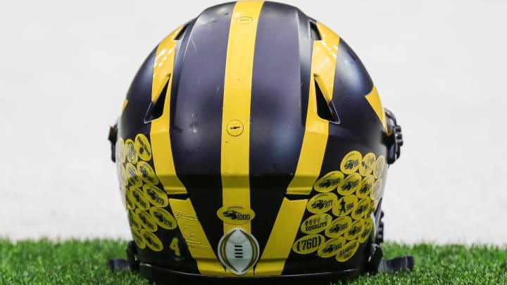A Michigan football helmet on the sideline during open practice at NRG Stadium in Houston, Texas on Saturday, Jan. 6, 2024.