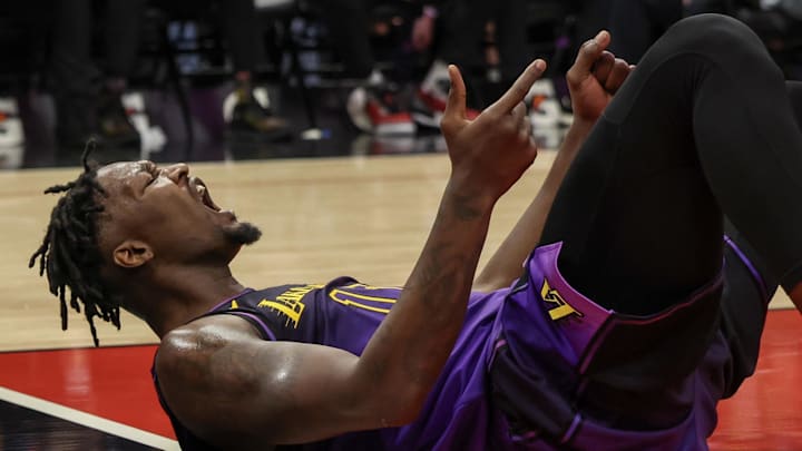 Jan 5, 2025; Houston, Texas, USA; Los Angeles Lakers forward Dorian Finney-Smith (17) reacts after making the basket and being fouled by Houston Rockets center Alperen Sengun (28) (not pictured) in the fourth quarter at Toyota Center. Mandatory Credit: Thomas Shea-Imagn Images